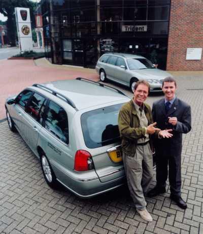 The picture show MG Rover Company Fleet Loans Manager Richard Griffith, handing over the keys to Sir Cliff Richard 