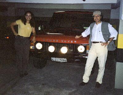 Mauro with wife and car. 
